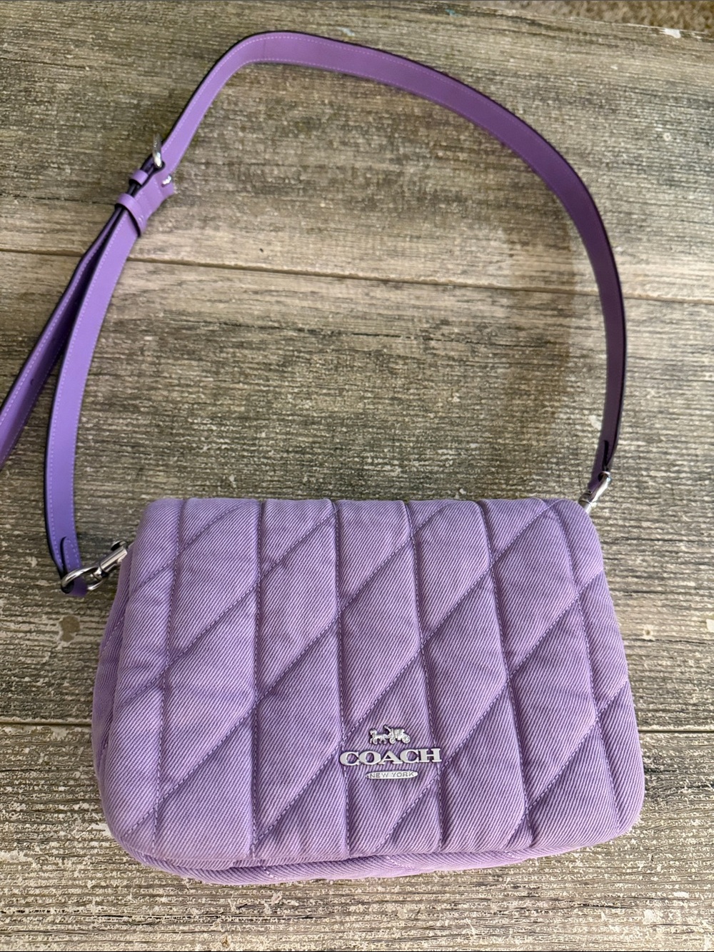Coach quilted purple flap opening crossbody purse